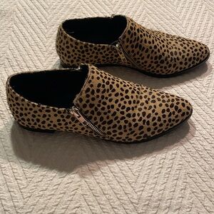 Sole Society animal print fur shoes with zipper details.